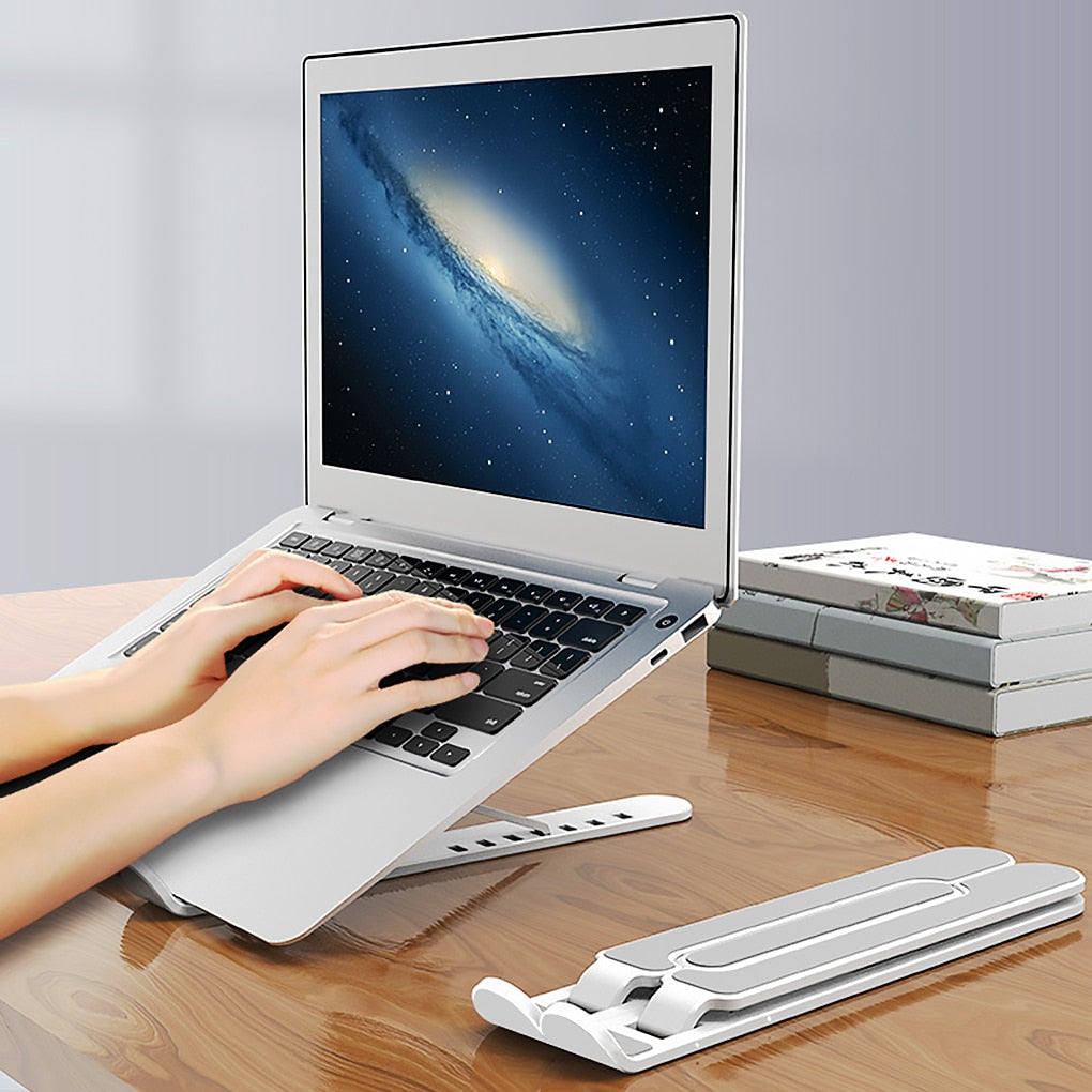 Soporte Plegable Portátil para Laptop – Altura Ajustable con Diseño Ventilado